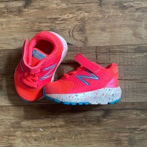 Hot pink New Balance baby shoes